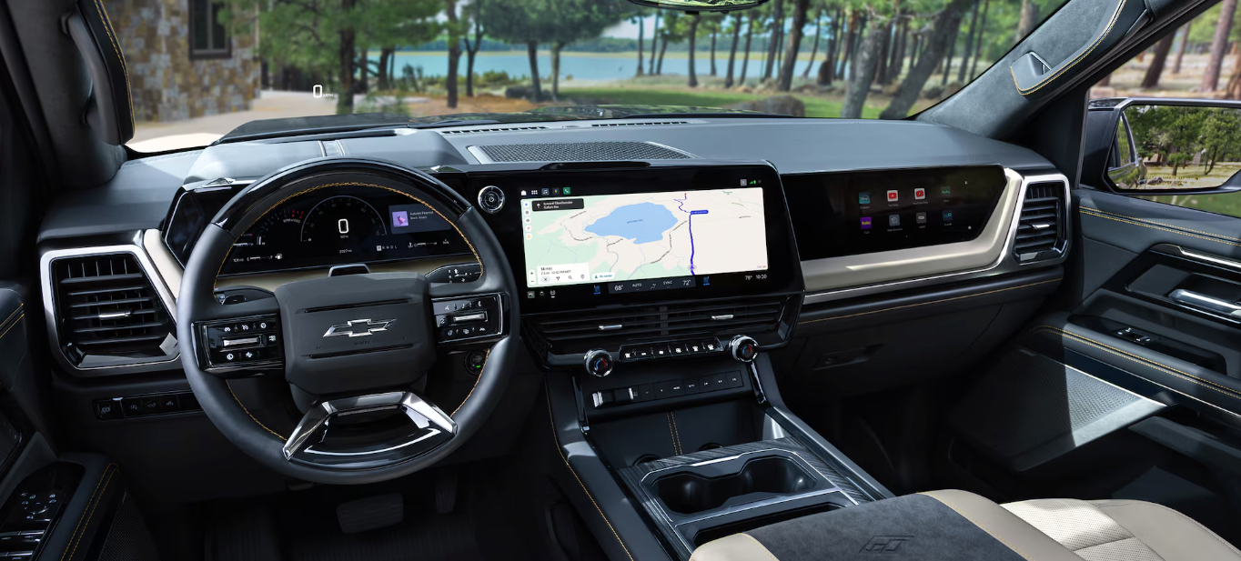 2027 Chevrolet Silverado 1500 ZR2 on off-road terrain showing 2-inch factory lift and mud-terrain tires