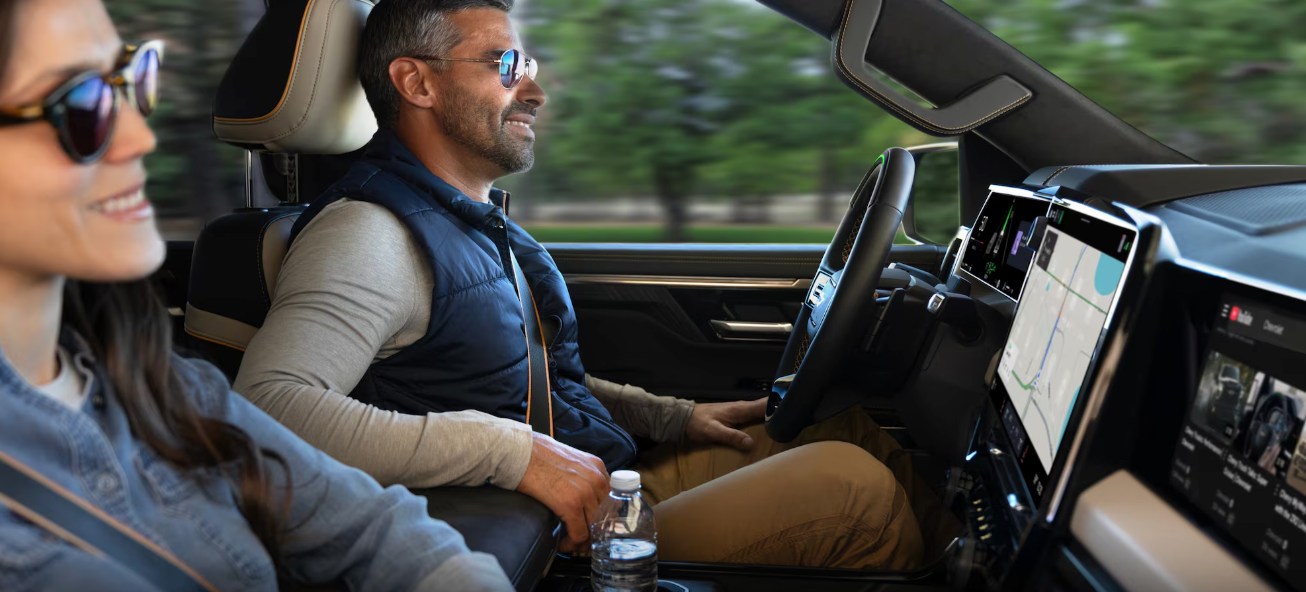 2027 Chevrolet Silverado 1500 interior showing 16.3-inch center display and folding console workspace