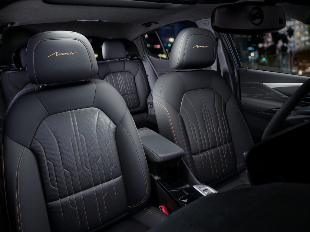Interior image of Buick 2026 Envista Avenir, showing Perforated Leather-Appointed Ebony seats interior with Terracotta stitching