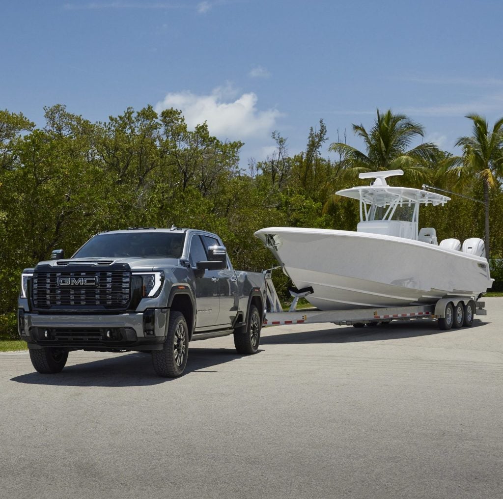 2026 GMC Sierra 2500 HD Denali Ultimate Crew Cab Standard Box in Sterling Metallic Towing / hauling / launching boat