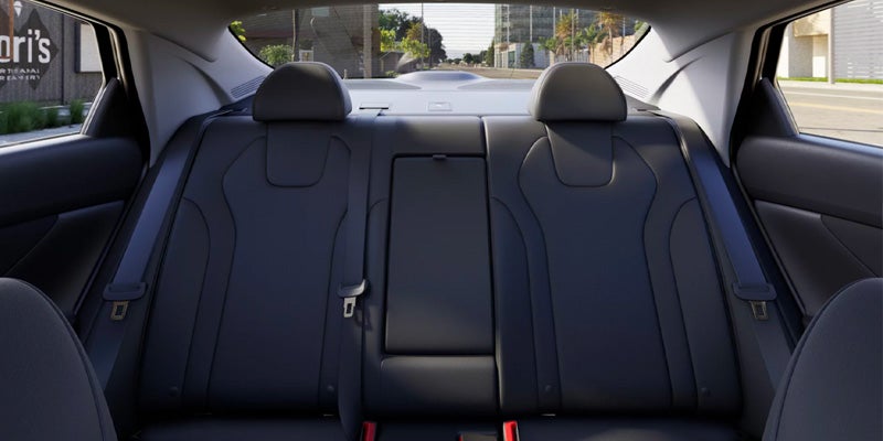 A view of the backseat in a 2025 Hyundai ELANTRA, featuring black seats and headrests.