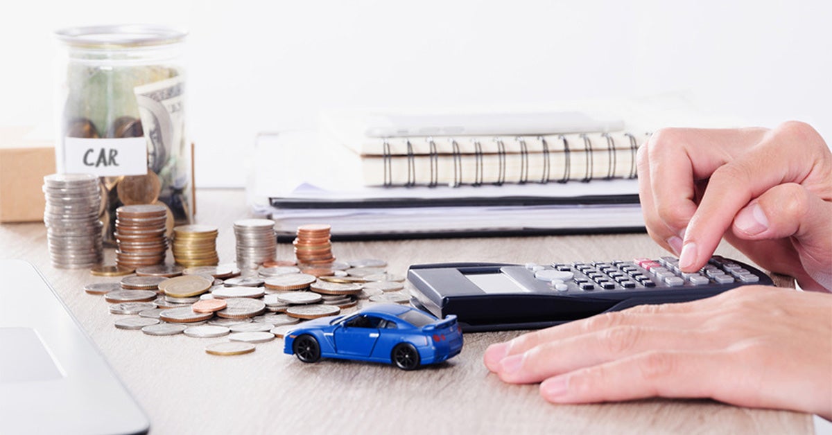 Customer working on financing and lease paperwork.