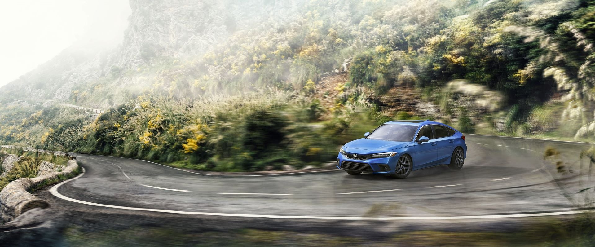 2023-Honda-Civic-Hatchback-Sport Touring-CurvedRoad-web