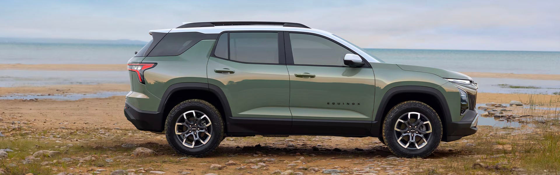 A 2025 Chevrolet Equinox parked on a sandy beach.