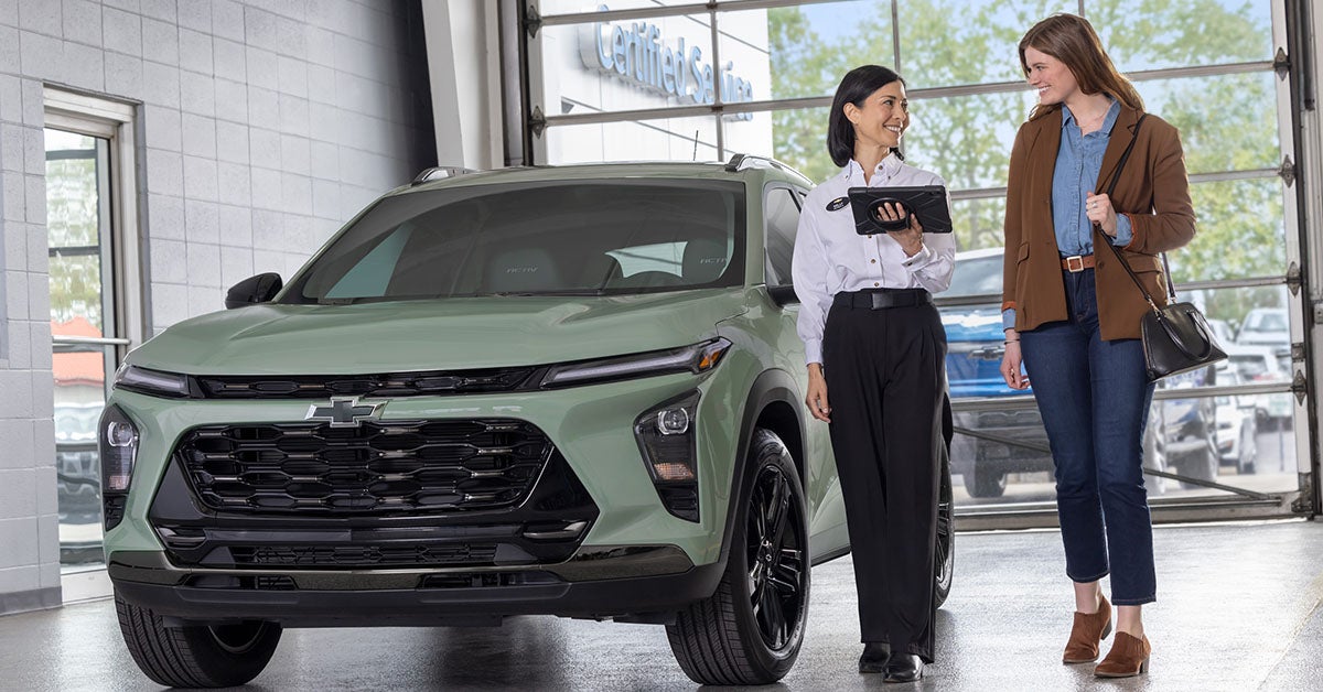 Chevy sales rep speaking with customer