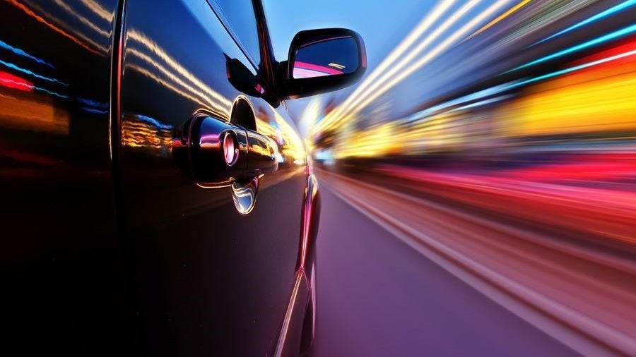 car being test driven in the evening