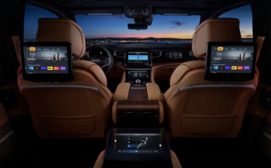 view of Jeep Wagoneer from back seat