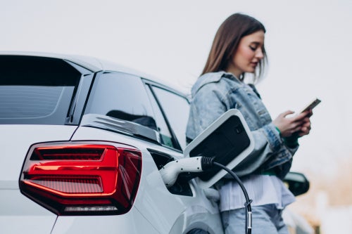 Person Charging their EV