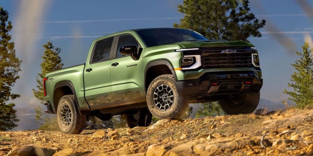 2027-chevrolet-silverado-1500-trail-boss-moss-green-offroad-jump