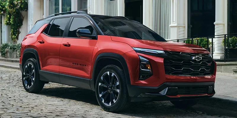 2027 Chevrolet Equinox parked in profile on an open paved surface