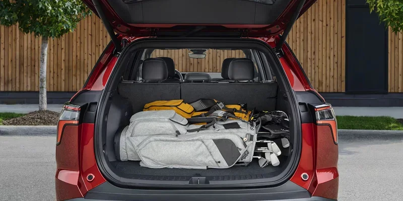 2027 Chevrolet Equinox front seats and center console viewed from the passenger side