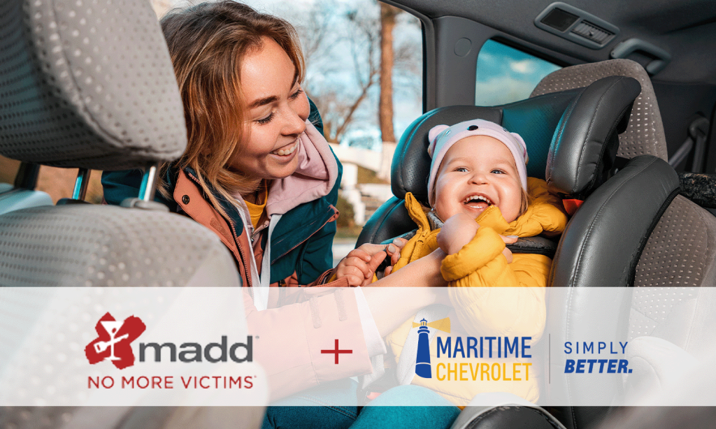 Woman and a baby in a carseat