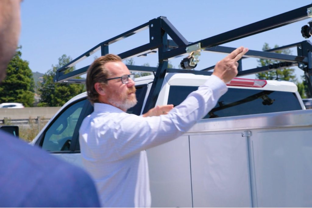 Chevy work truck with service body and ladder rack at Platinum Chevrolet in Santa Rosa, shown during a commercial vehicle walkaround.