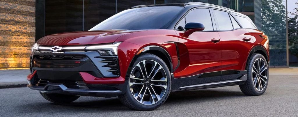 Side view of a red 2024 Chevy Blazer EV.