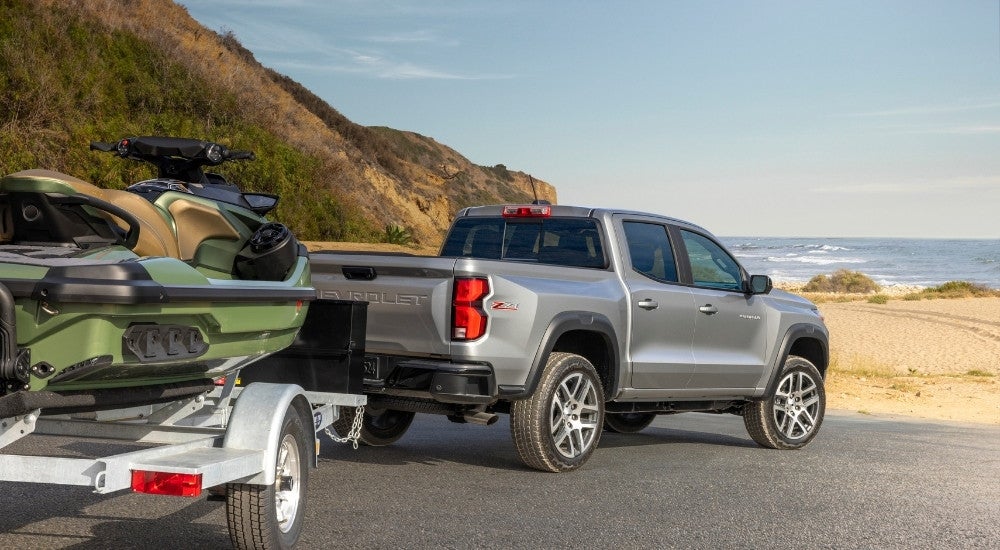 A silver 2024 Chevy Colorado Z71 from the rear.