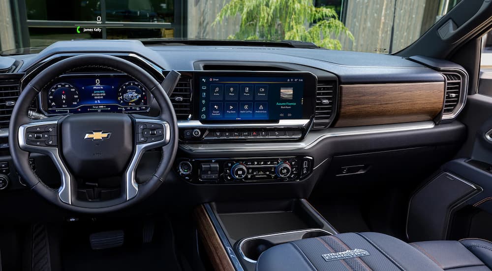 Black and brown dashboard and center console in a 2024 Chevy Silverado 3500HD.