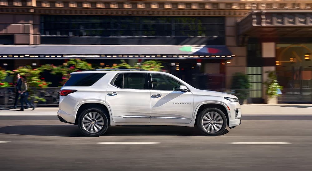 A white 2021 Chevy Traverse from the side.
