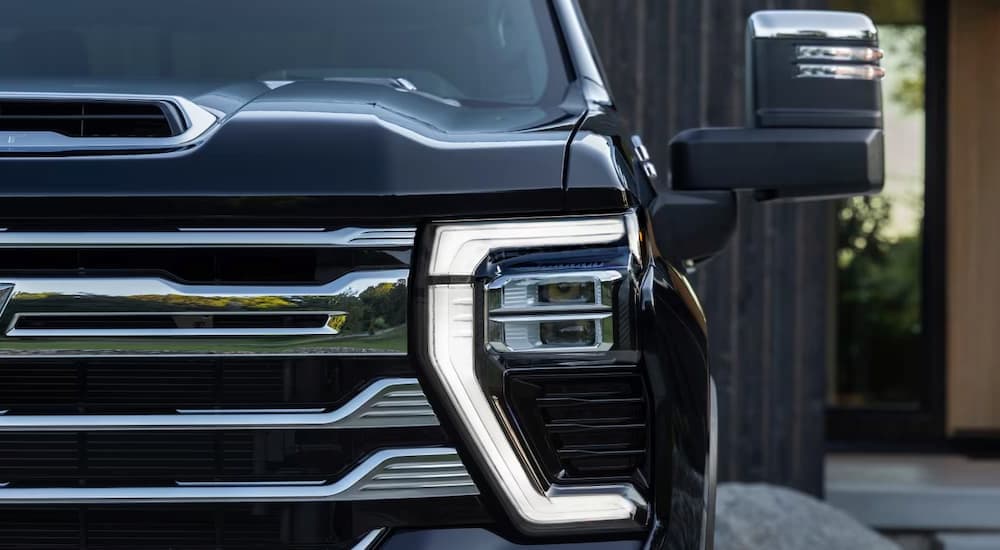 Front grille of a black 2025 Chevy Silverado 2500 for sale near San Antonio