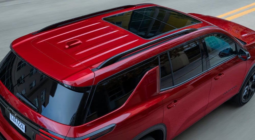 Exterior details on a red 2024 Chevy Traverse RS.