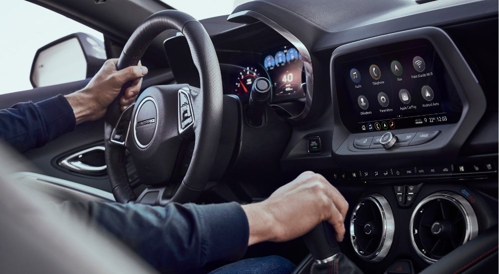 The black interior of a 2023 Chevrolet Camaro.