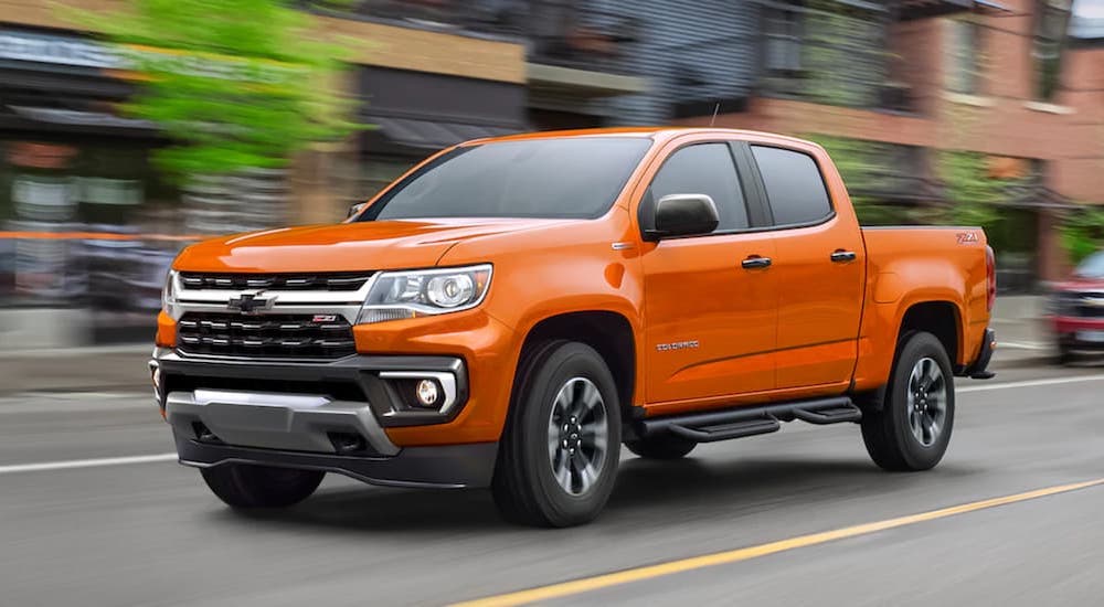An orange 2021 Chevy Colorado Z71 from the front.