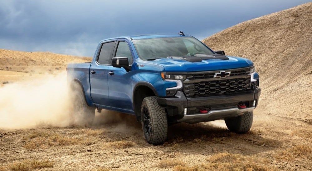 A blue 2022 Chevy Silverado 1500 ZR2 off-roading.