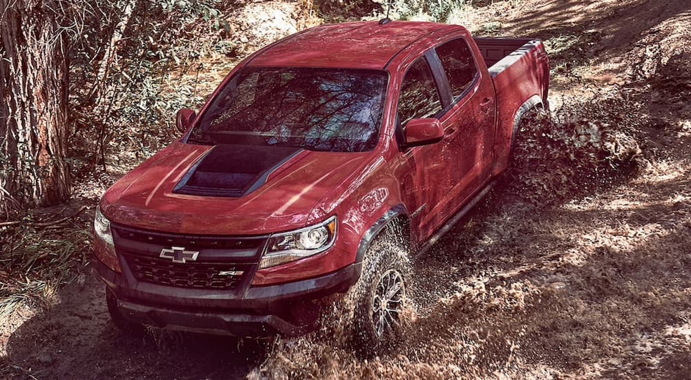 A red 2017 Chevy Colorado ZR2 from the front after leaving a used truck dealership.