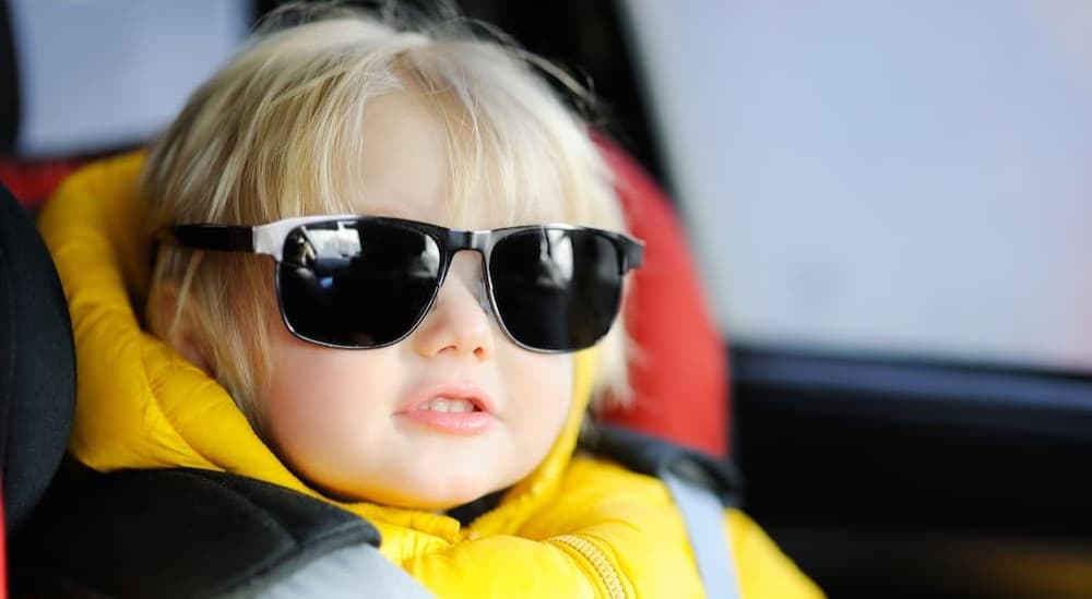 A child wearing sunglasses.