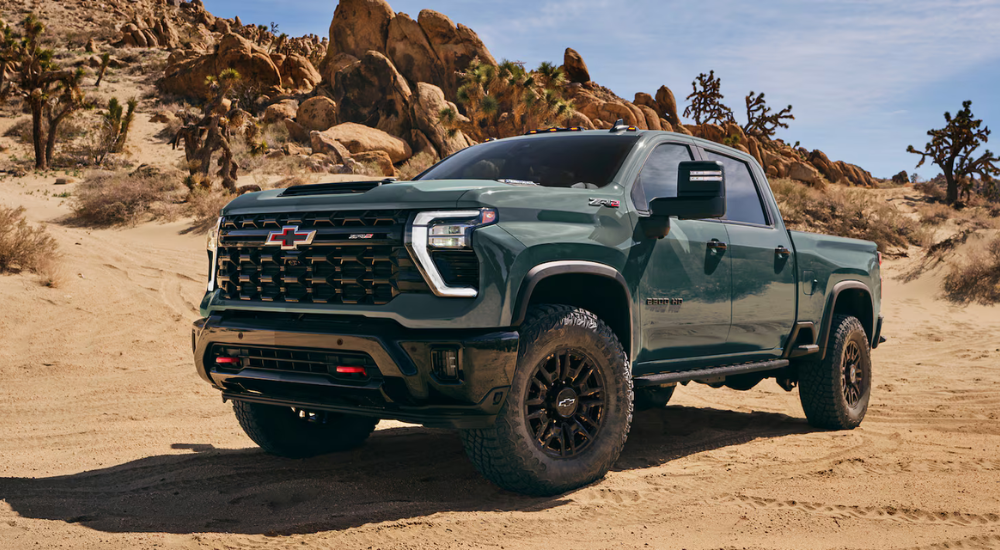 Green 2026 Chevy Silverado 2500 HD ZR2 parked off road