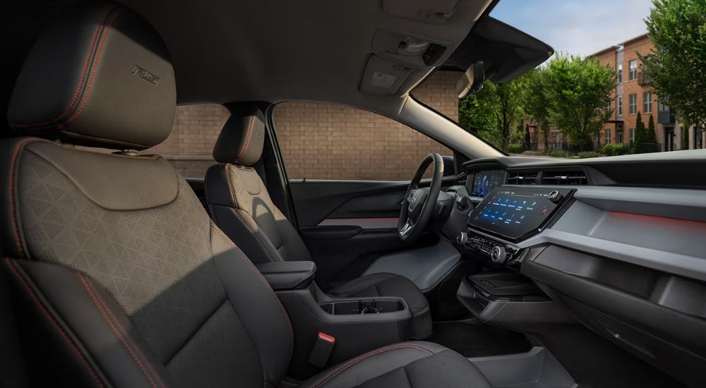 Black interior seating and dashboard in a 2027 Chevy Bolt