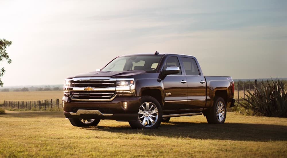 A purple 2017 Chevy Silverado 1500 parked off-road.
