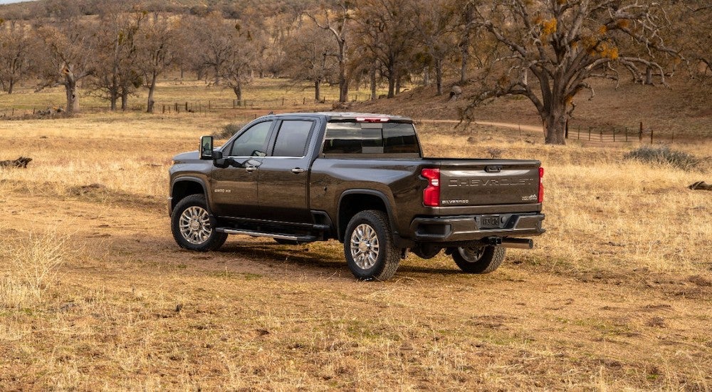 A black 2022 Chevy Silverado 2500 HD parked off-road.