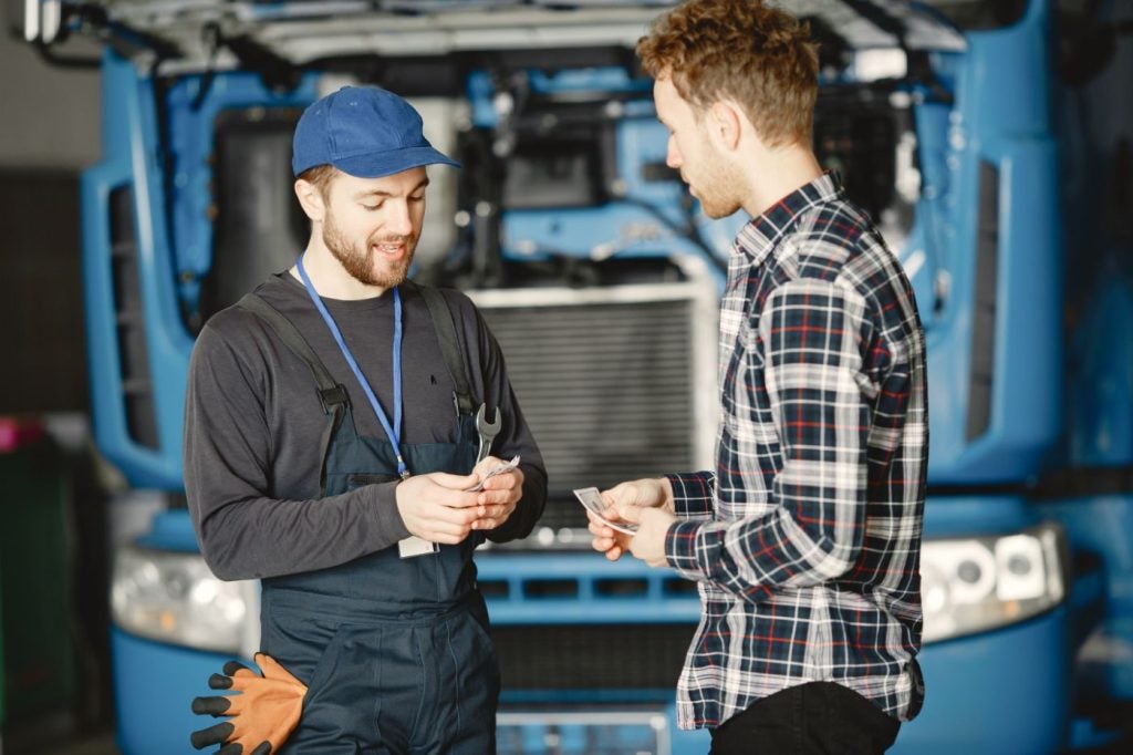 Business owner reviewing company performance metrics
