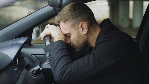 person behind the wheel