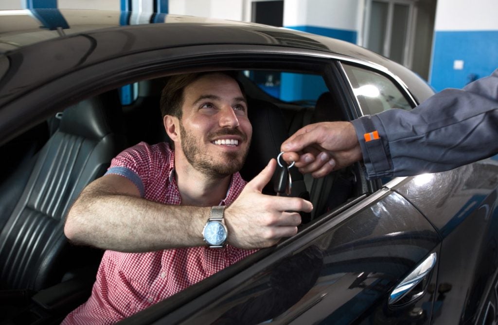 Man receiving car keys