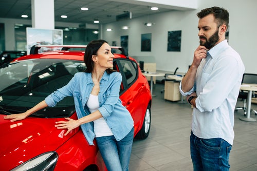 People at car dealership