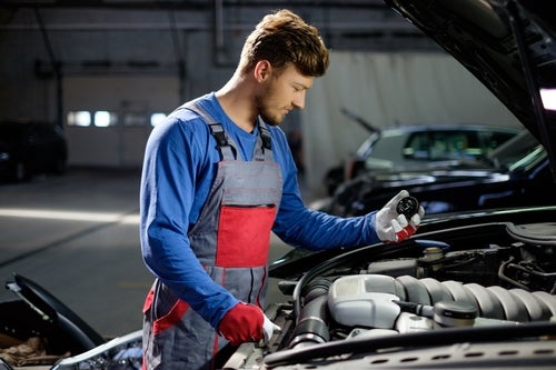 Service Tech working on a car