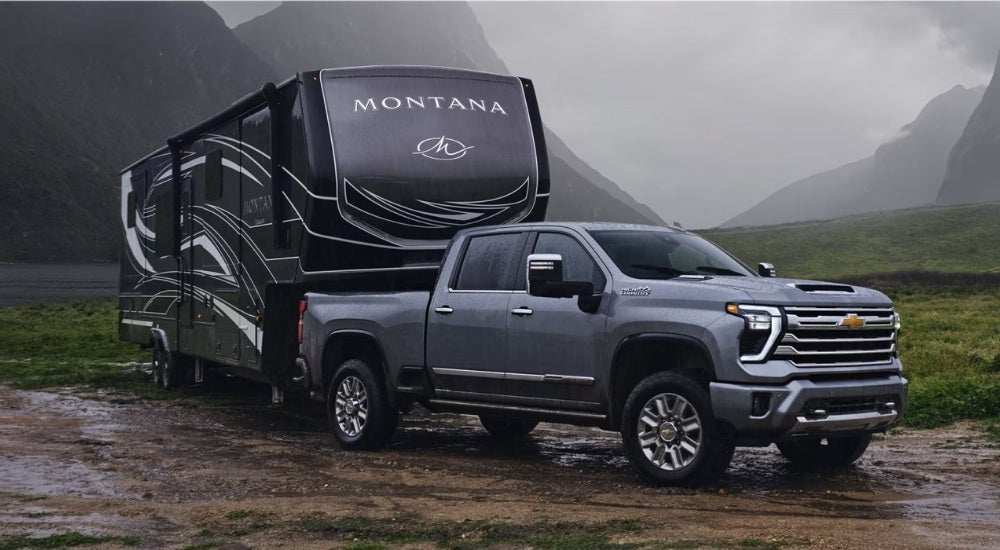 A grey 2023 Chevy Silverado 2500 HD after leaving a dealer that has used trucks for sale.