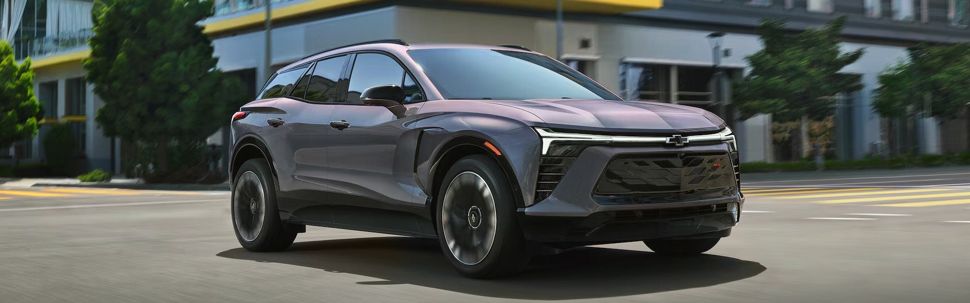 2026 Blazer EV parked in front of an office park