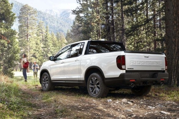 2026 Honda Ridgeline parked in a wooded area
