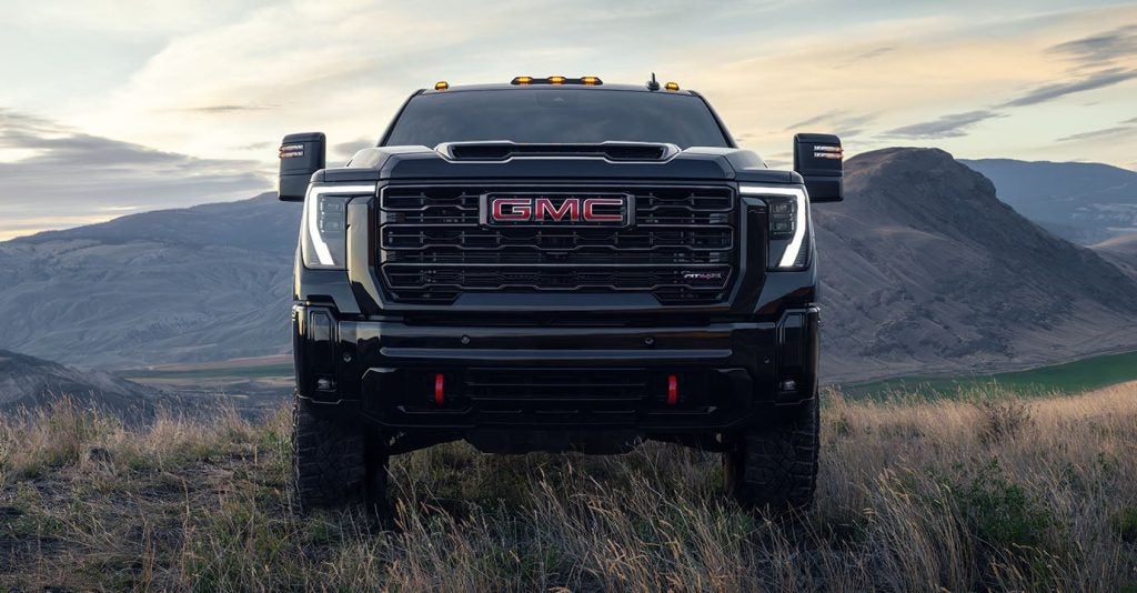 2025 GMC Sierra HD parked in a meadow