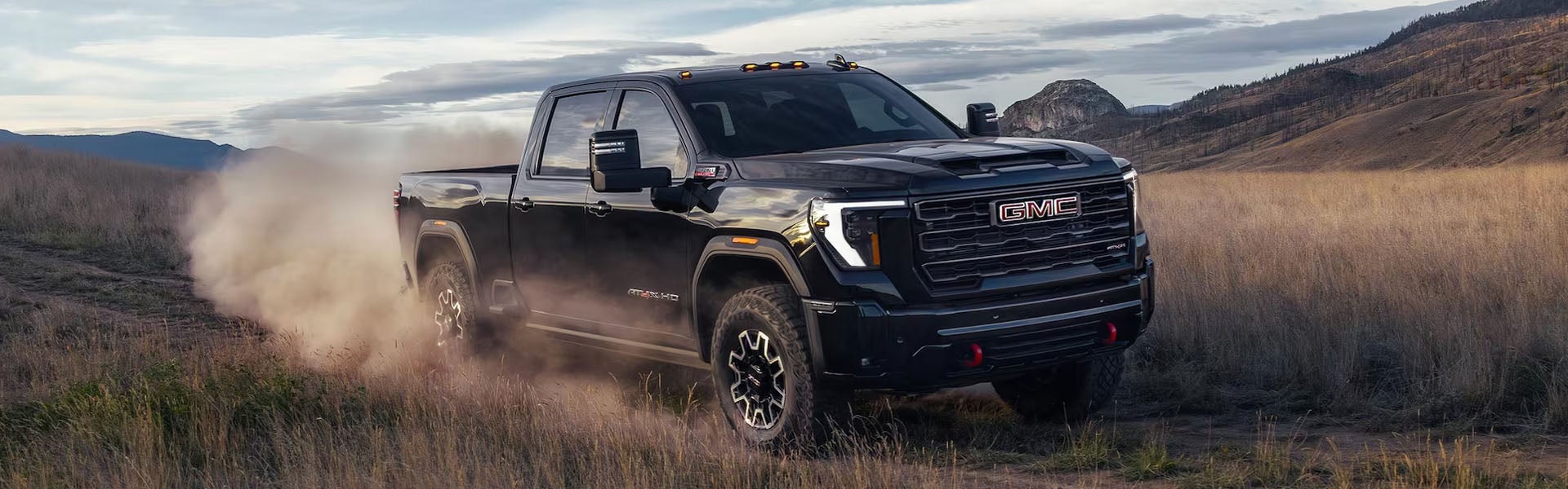 2026 Sierra 2500HD tearing it up on a dirt road