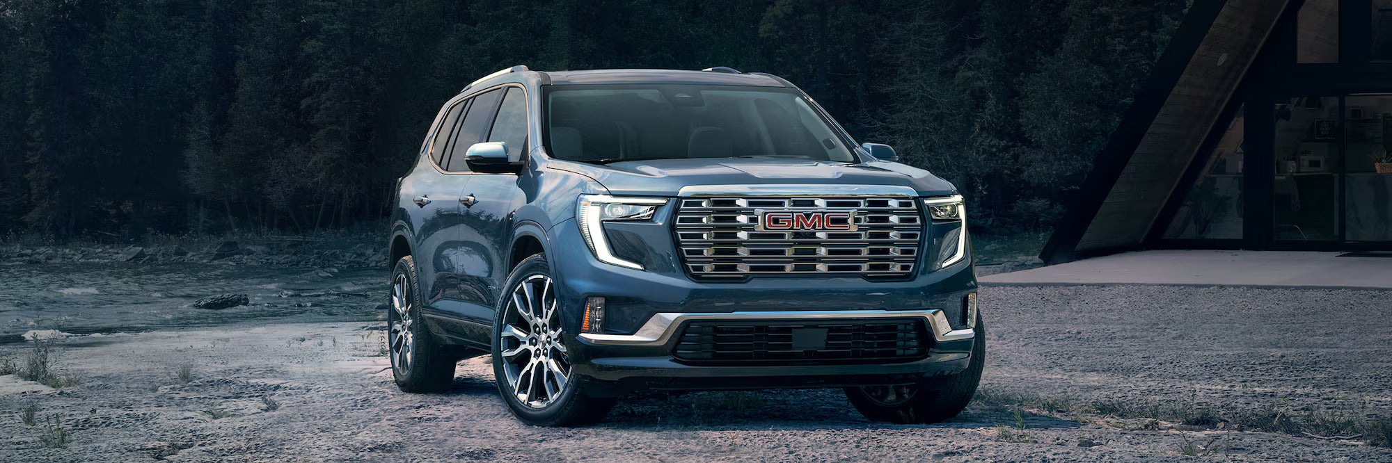 2026 GMC Acadia Denali luxury SUV parked outdoors showcasing premium exterior design