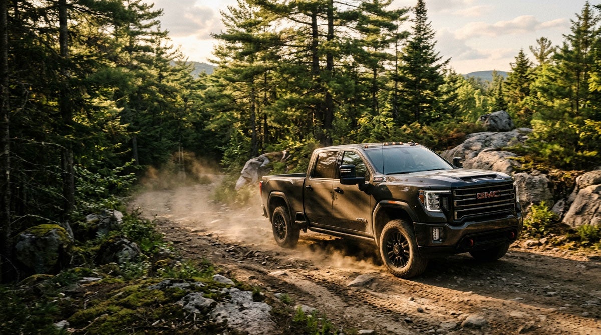 GMC Sierra 2500HD AT4 on a Maine dirt camp road