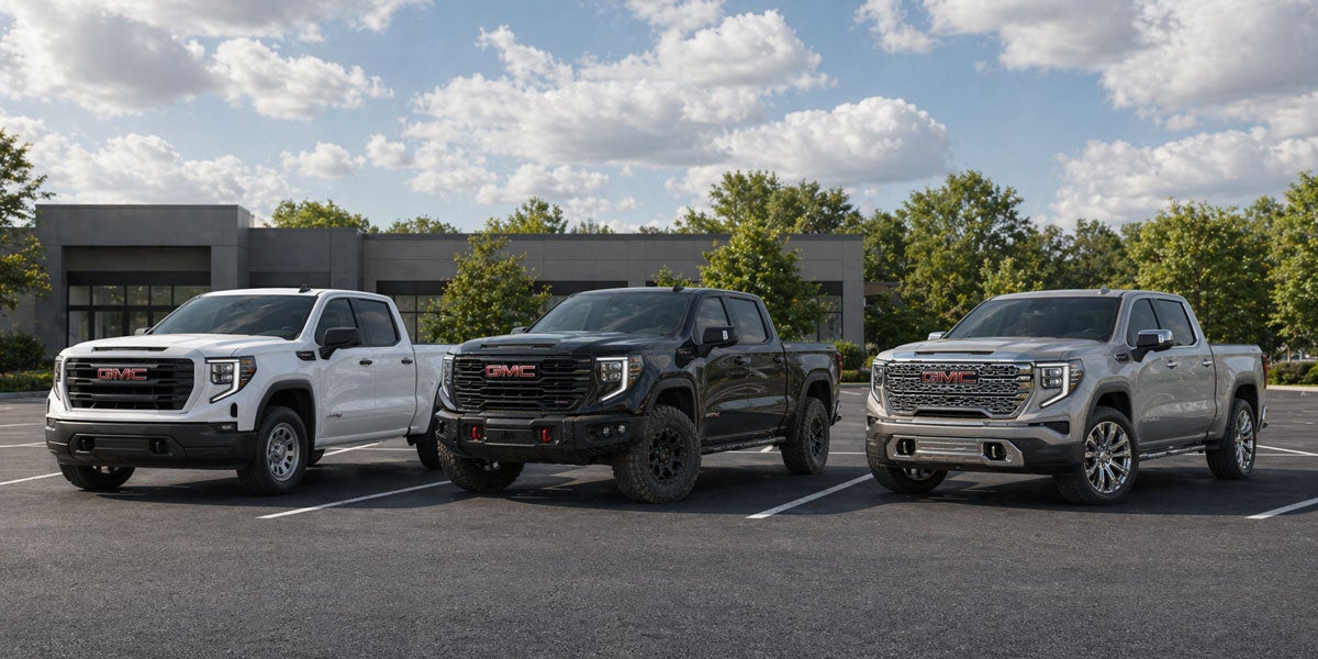 2026 GMC Sierra 1500 full trim lineup at Portland Jetport — Pro, SLE, SLT, AT4, AT4X, Denali, and Denali Ultimate