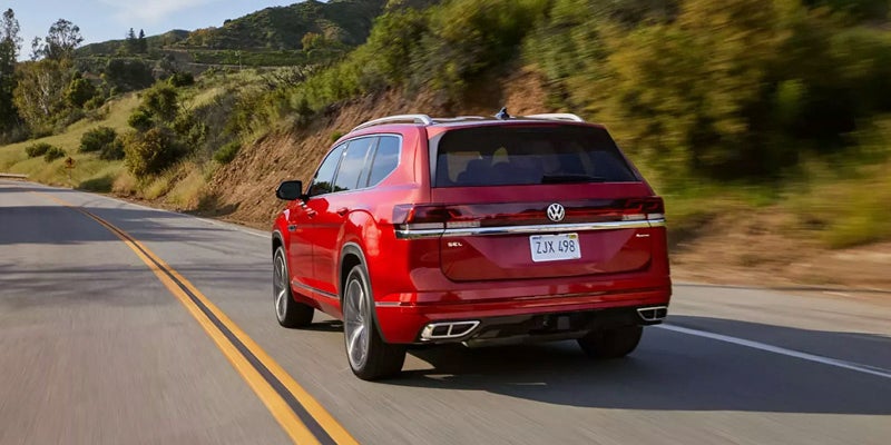 A 2026 Volkswagen Atlas driving away in Rogers, AR 