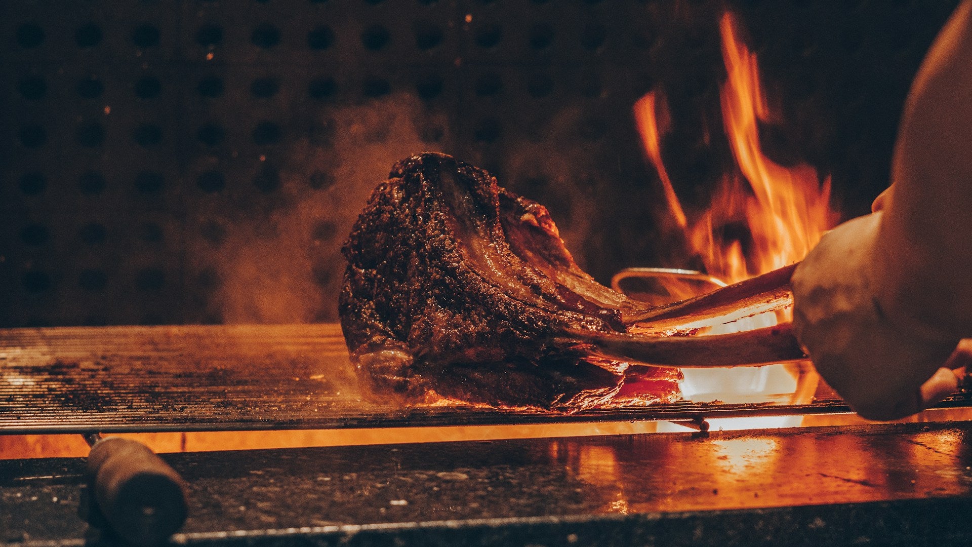 meat being grilled at bbq restaurant