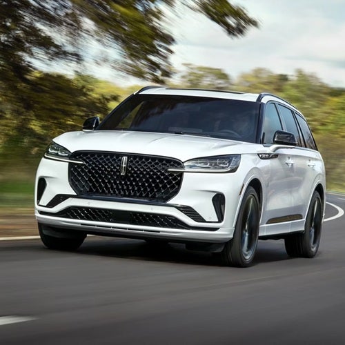 2026 Lincoln Aviator driving down the road