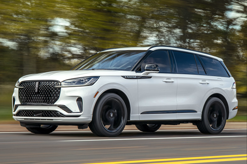 2026 Lincoln Navigator driving down the road