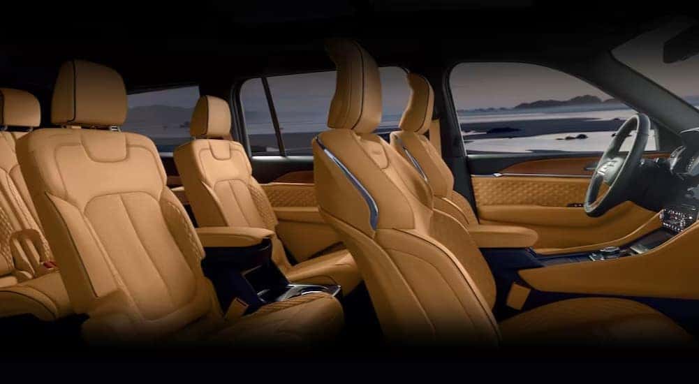 The brown interior is shown in a 2024 Jeep Grand Cherokee.